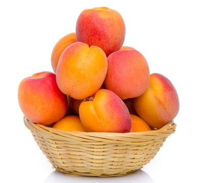 Mound of apricots in a basket
