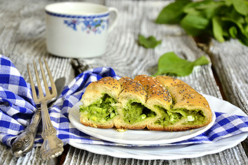 Spiral pie with cheese and spinach.