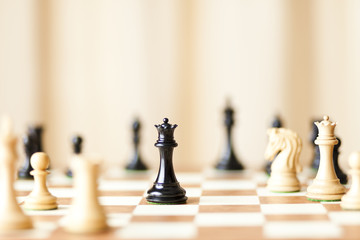 Chess pieces set on a chessboard