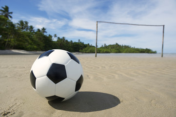 Fototapeta na wymiar Soccer Ball on Brazilian Beach Football Pitch