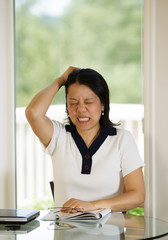 Mature woman expressing extreme Stress