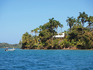 Tropical home on an island in the Caribbean sea © dam
