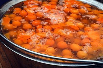 Lots of broken eggs in a large bowl