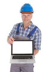 Manual Worker Displaying Laptop