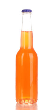 Tasty Orange Drink In Bottle Isolated On White