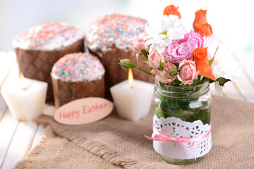 Fototapeta na wymiar Beautiful bouquet of bright flowers in jars