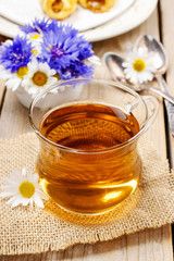 Chamomile tea on wooden table