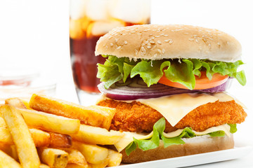 Chickenburger and glass of cola with ice