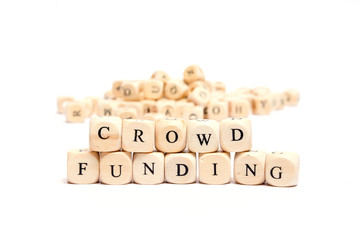 word with dice on white background- crowd funding