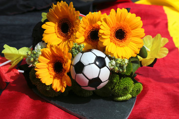 Blumenstrauß auf Fahne