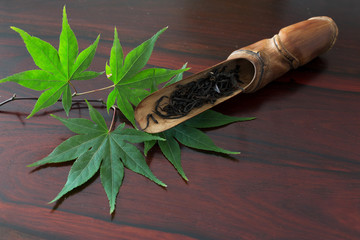 Black tea with wooden table