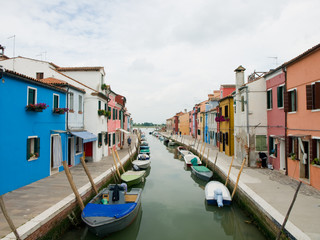 Fototapeta na wymiar Burano island canal with colorful houses, Venice