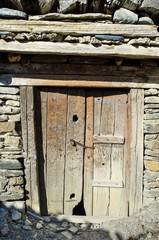 Old door of old cottage in Nepal