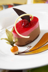 close up chocolate and strawberry cheese cake in coffee shop