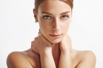 woman with ideal skin looking at camera