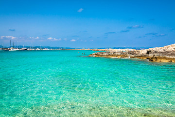 Fototapeta na wymiar Tourists in Illetes beach Formentera island, Mediterranean sea,