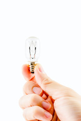 Man hand holding light bulb on white background