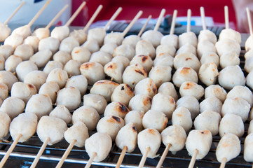 Traditional Thai meatballs on bamboo sticks
