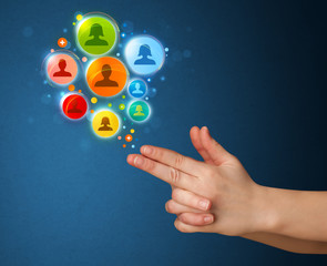 Social media icons coming out of gun shaped hand