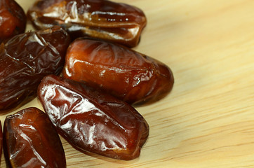 The dates close-up on wooden board