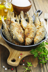 Fried fish in a frying pan