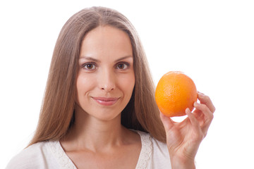 young woman holding a orange