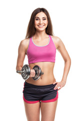 Beautiful slim woman with dumbbells, isolated on white