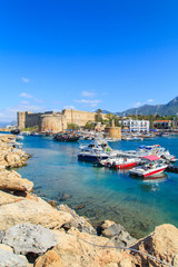 Boats in a port of Kyrenia (Girne) with a castle, Cyprus