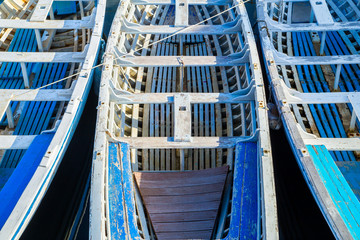 Fototapeta na wymiar Blue boats in a port