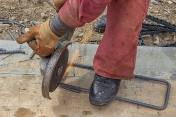 Cutting spacer for the rebar in a concrete post