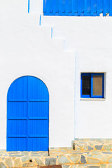 Blue windows of one of buildings in Cyprus