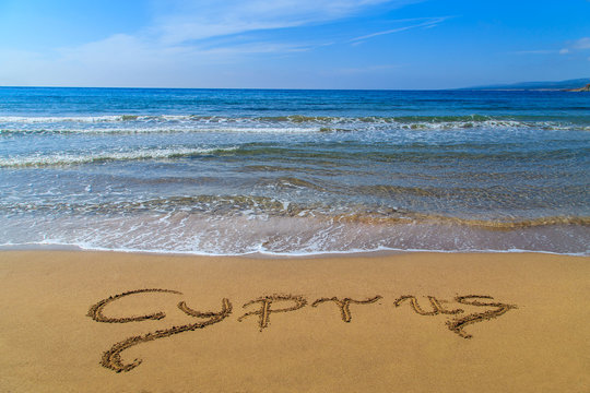 Cyprus written on sandy Golden Beach near Polis, Cyprus