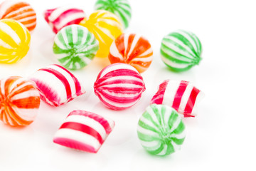 colored candies isolated on white.