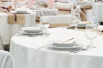 an image of tables setting at a luxury wedding hall