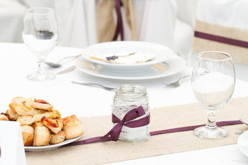 an image of tables setting at a luxury wedding hall