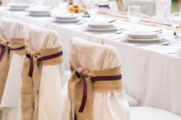 an image of tables setting at a luxury wedding hall