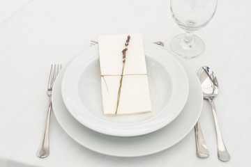 dining table setting with lavender - closeup