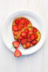 French toasts with fresh strawberries