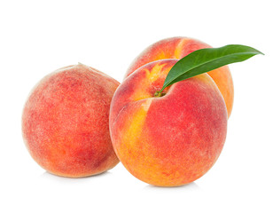 Ripe peaches fruit isolated on white background