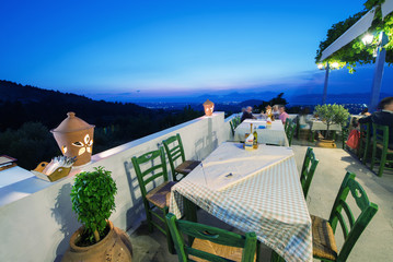 KOS, GREECE - JUNE 6, 2014: Restaurant view at night in Zia vill