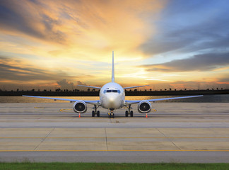 Fototapeta na wymiar passenger jet plane parking on airport runways use for business