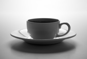 glass cup and saucer closeup