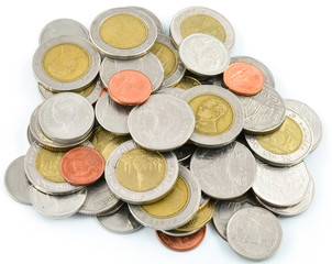 Stack of different coins taken closeup.