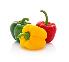 red green yellow pepper on white background