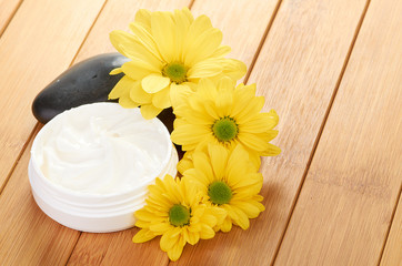 cosmetic cream with herbal flower