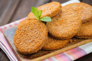Close-up of raw salmon cutlets on a cutting board, studio shot