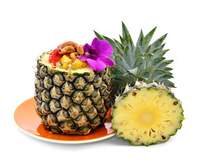 baked rice pineapple and vegetables served in pineapple