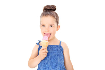 Cute little girl eating an ice cream