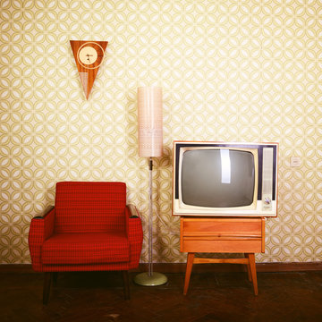 Vintage room with wallpaper, old fashioned armchair, retro tv, p