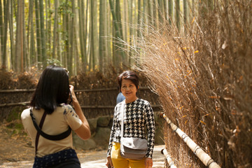 travel Japan, Senior tourist smiling for photo, Kyoto, Japana